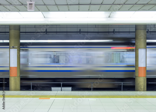 Obraz na plátně Motion blur side of high speed train in metro