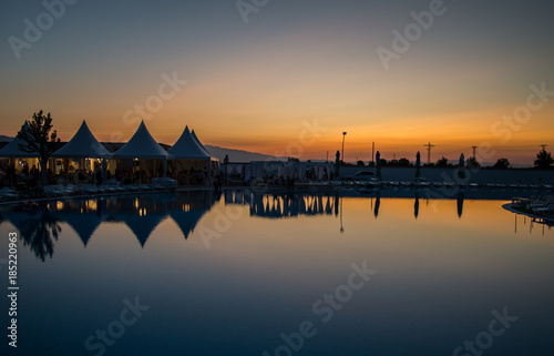 Panorama sunset water reflection view.