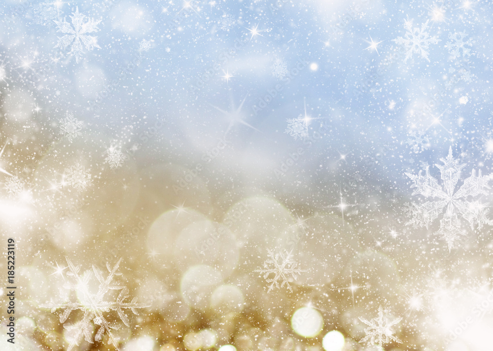 blurred bokeh background of christmas  lights and snowflakes