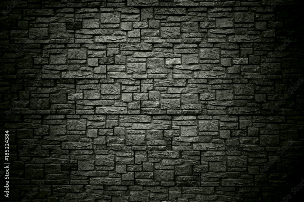 Stone wall. Background, texture stone bricks. Vignetting