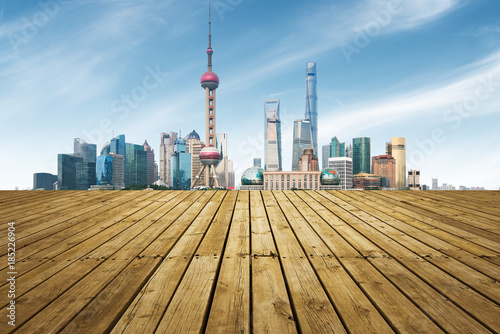 Canvas Print Empty square floor and with cityscape and skyline at sunset in Shanghai,China