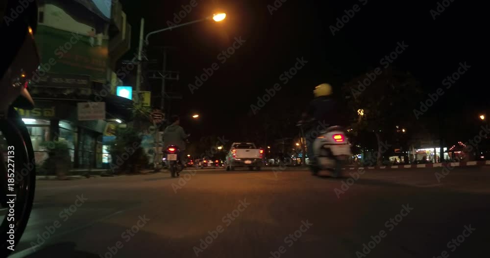 CHIANG MAI, THAILAND, MARCH 2017: Street view drive of Chiang Mai, North Thailand, at night CHIANG MAI, THAILAND, MARCH 2017: Street view drive of Chiang Mai, North Thailand, at night