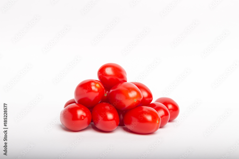 mini tomatoes in a bag isolated on a white background mini tomatoes in a bag isolated on a white background