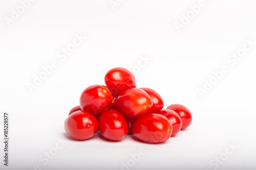 mini tomatoes in a bag isolated on a white background