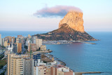 Calpe Rock, Ifach, shrouded in cloud, from downtown Calpe, Spain.