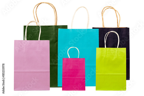 Multicolored paper bags for shopping isolated on white