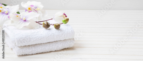 Spa still life with orchid flower and towels
