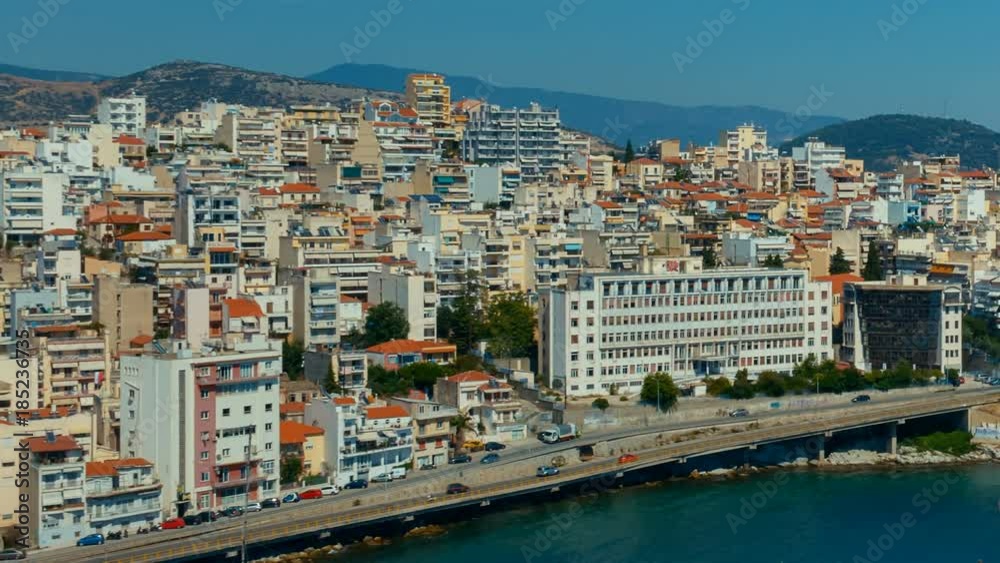 Telephoto establishing shot of the city of Kavala in Greece. Kavala is the main seaport of eastern Macedonia Telephoto establishing shot of the city of Kavala in Greece. Kavala is the main seaport of eastern Macedonia