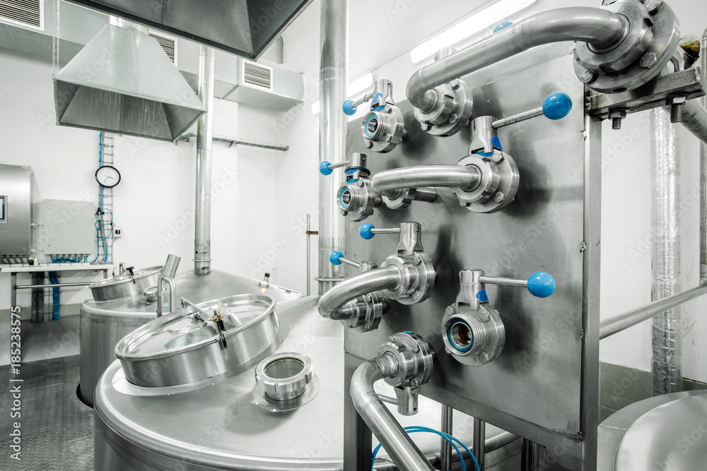 Equipment for the brewery. Large shiny tanks. Equipment for the brewery. Large shiny tanks.