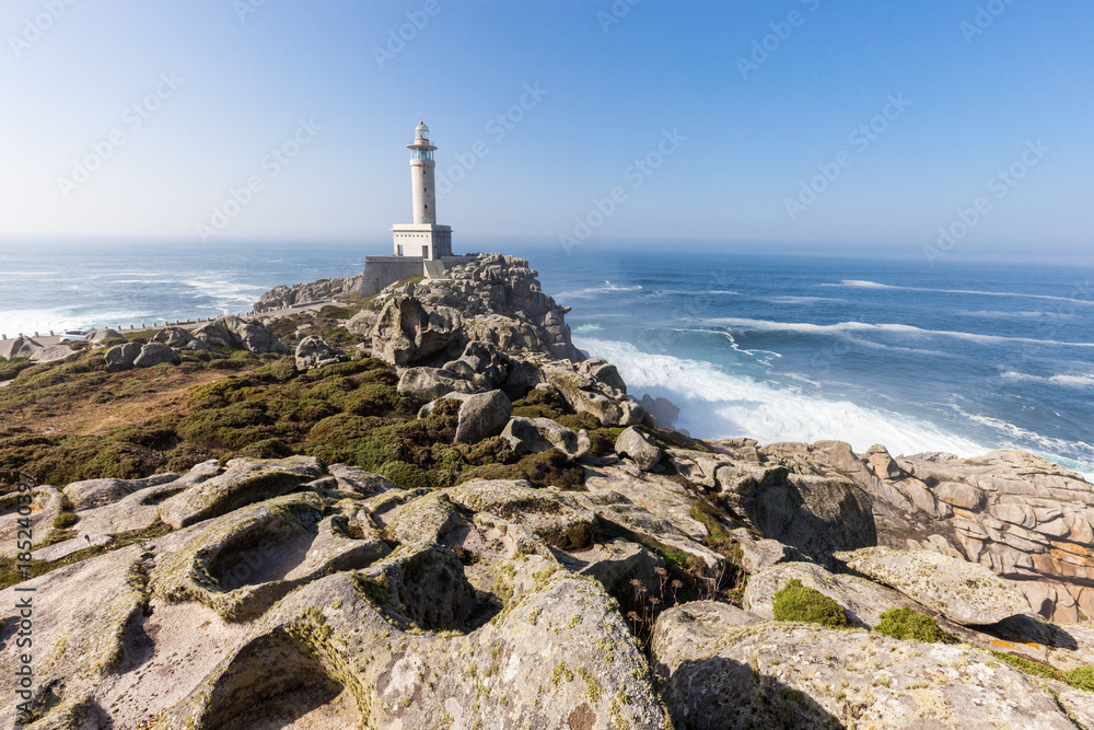 Punta Nariga Lighthouse at sunny summer day