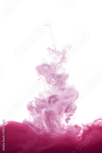 Fototapeta Naklejka Na Ścianę i Meble -  pink paint splash in water, isolated on white