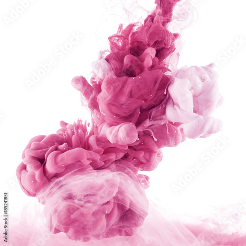 close up view of pink and light pink paint splashes in water, isolated on white