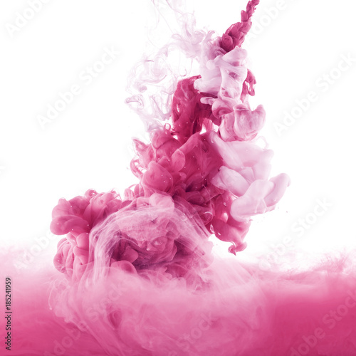 close up view of pink and light pink paint splashes in water, isolated on white