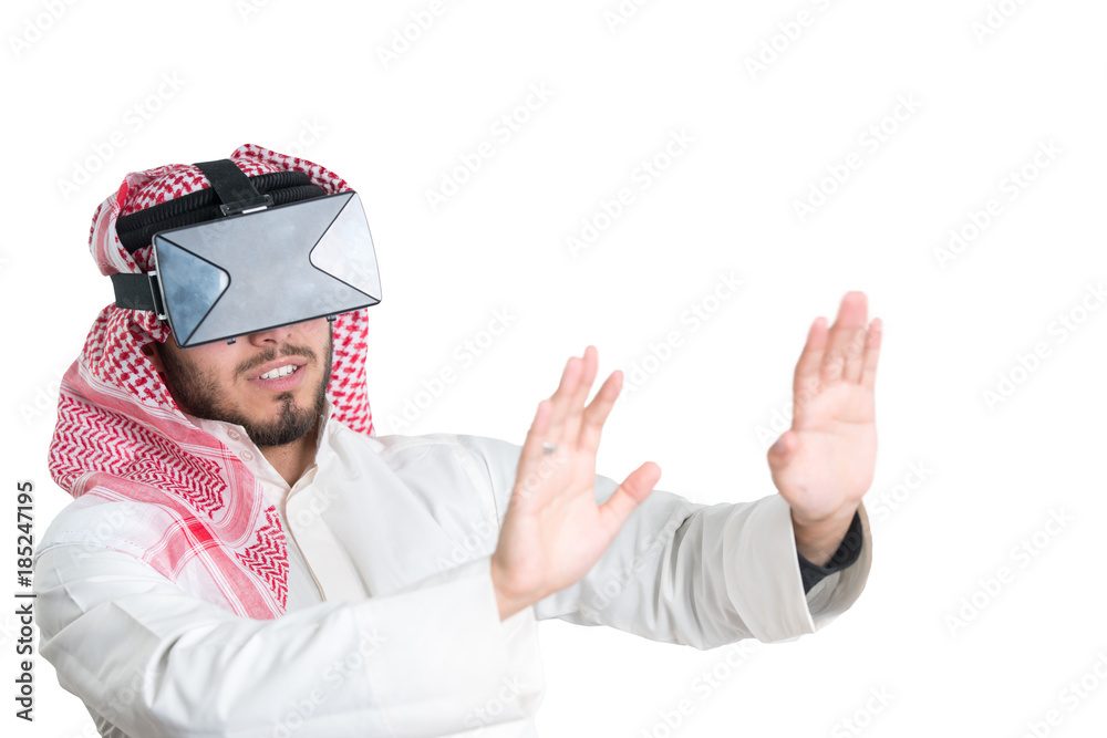 Young muslim guy trying VR glasses. Isolated. Young muslim guy trying VR glasses. Isolated.