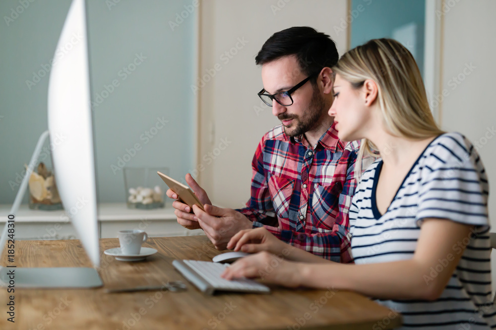 Young attractive designers working together from home Young attractive designers working together from home