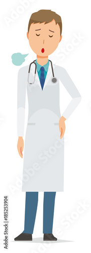 A young male doctor wearing a white suit is sighing