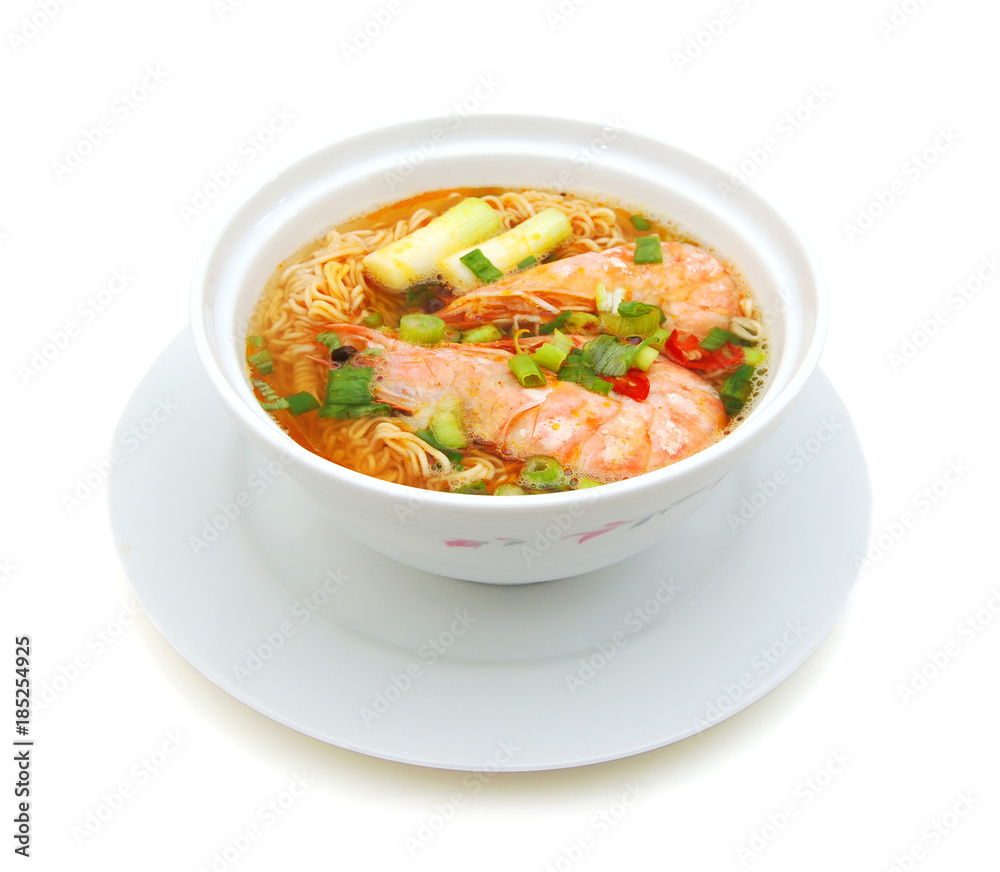 Asian noodle soup in front of white background