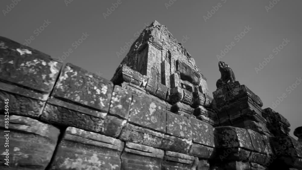 Looking up towards the sky at the temples of Pre Rup as the camera moves and turns. Looking up towards the sky at the temples of Pre Rup as the camera moves and turns.