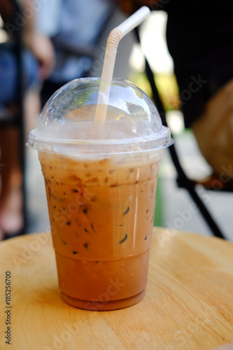 Iced latte coffee with straw