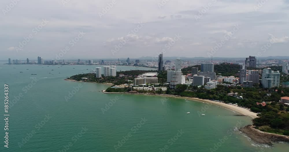 PATTAYA, THAILAND, MARCH 2017: Aerial view over Pattaya Beach, harbour, and downtown area PATTAYA, THAILAND, MARCH 2017: Aerial view over Pattaya Beach, harbour, and downtown area