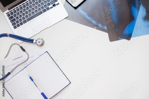 Conceptual workplace of a pulmonologist and a new contract photo