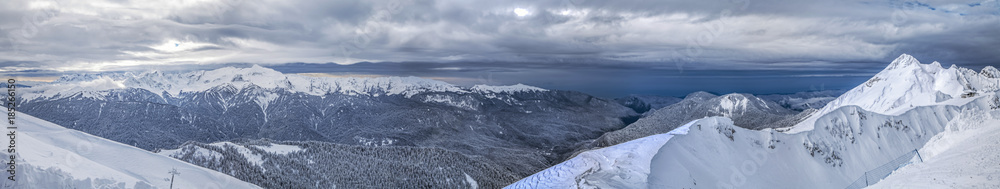 Against the background of the Black Sea, snow-capped mountains. Sochi, Russia