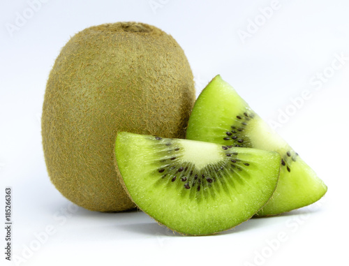 Slice of fresh kiwi fruit isolated on white background, with clipping path
