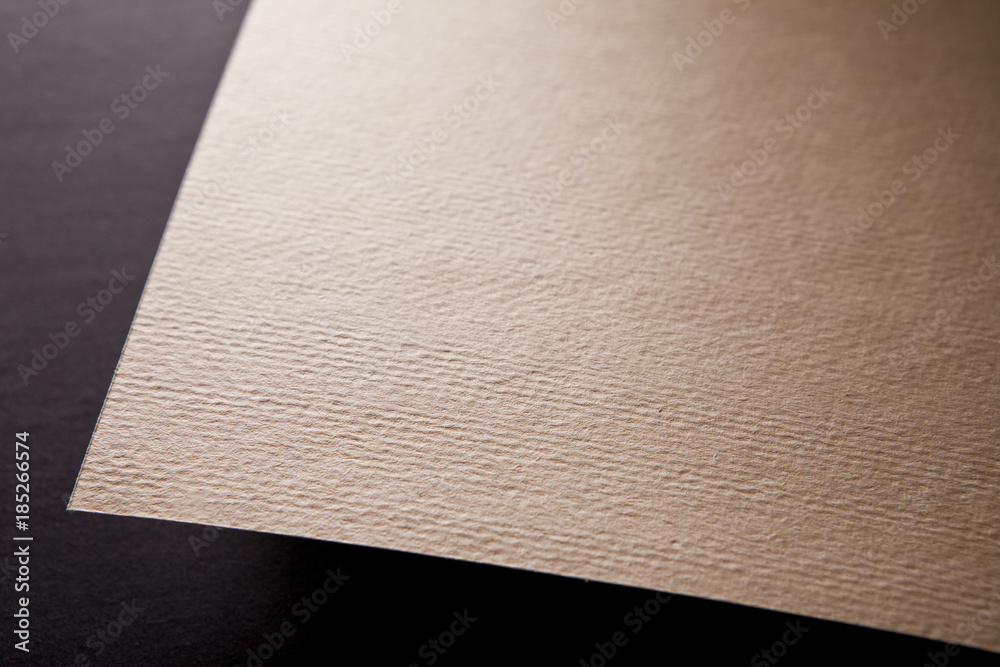 Macro shot of corner of paper. Mockup. Close up. Macro shot of corner of paper. Mockup. Close up.