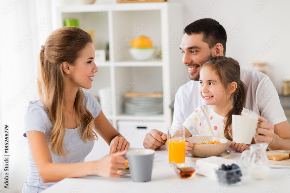 happy family having breakfast at home happy family having breakfast at home