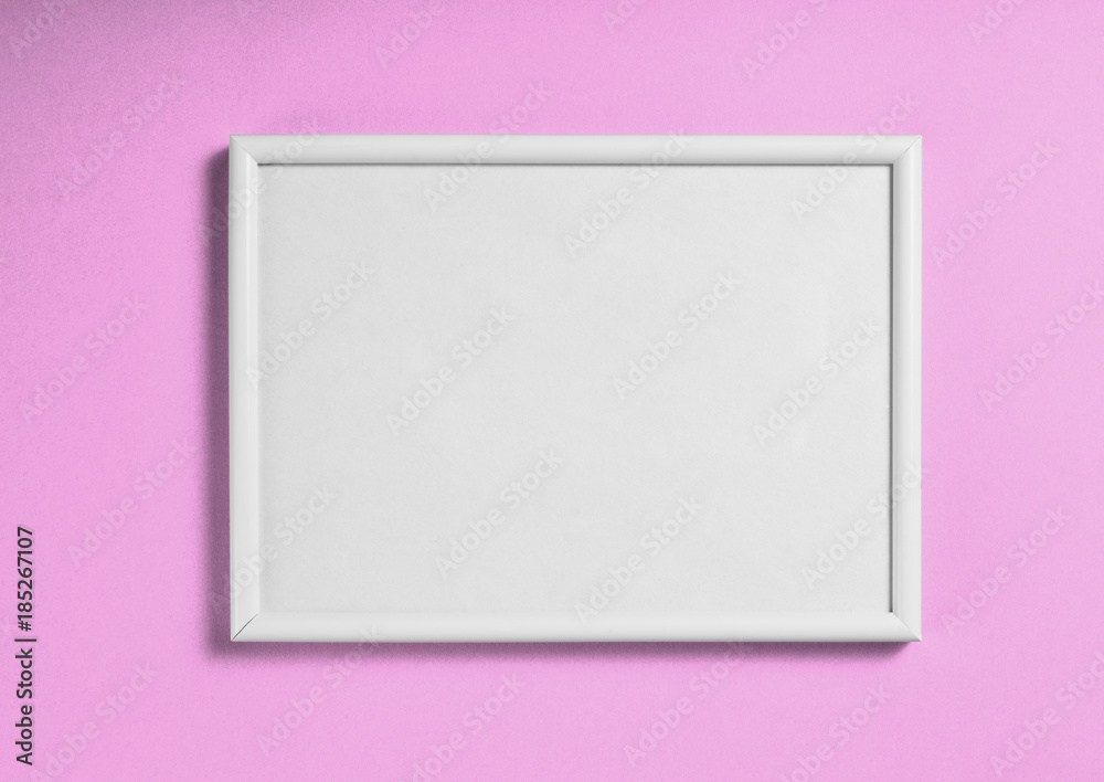White wooden frame for painting or picture on pink background.