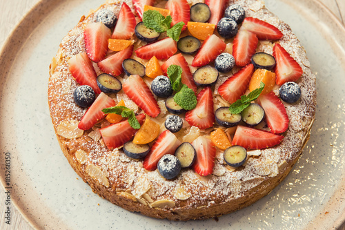 Sweet bright cakes with fru...