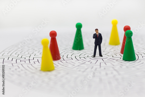 Miniature people : Businessmen are looking solution for problem, using as find a solution for the business concept.