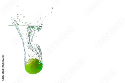 Green apple Water Splash background blur