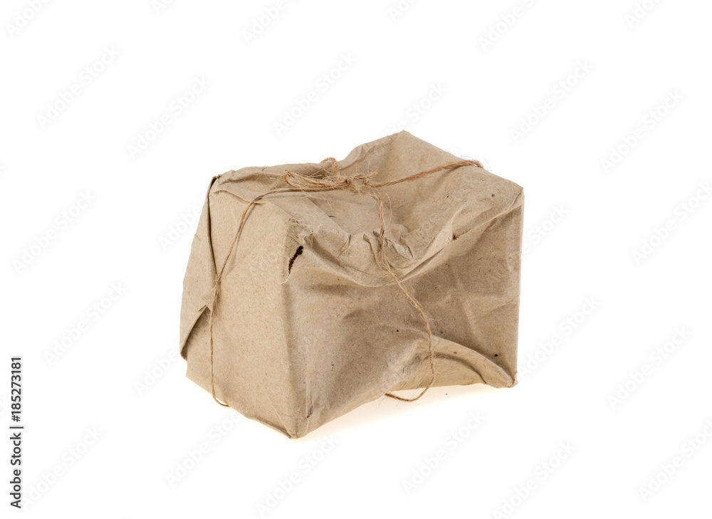 crumpled parcel postmarked destroyed, isolated on a white background crumpled parcel postmarked destroyed, isolated on a white background