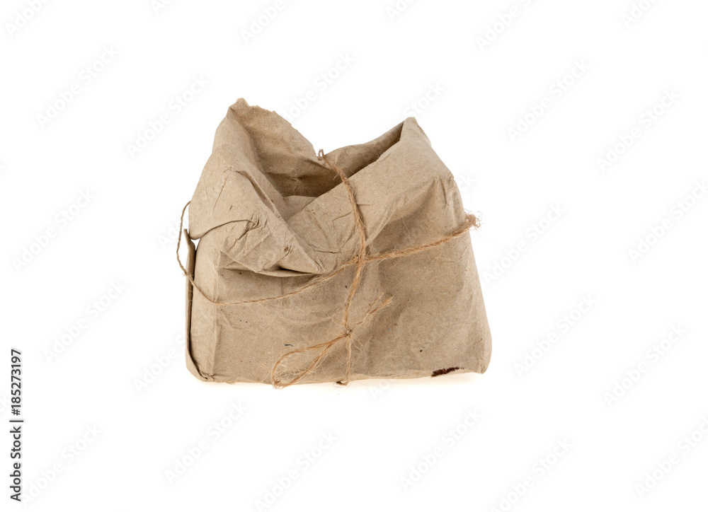 Obraz premium crumpled parcel postmarked destroyed, isolated on a white background