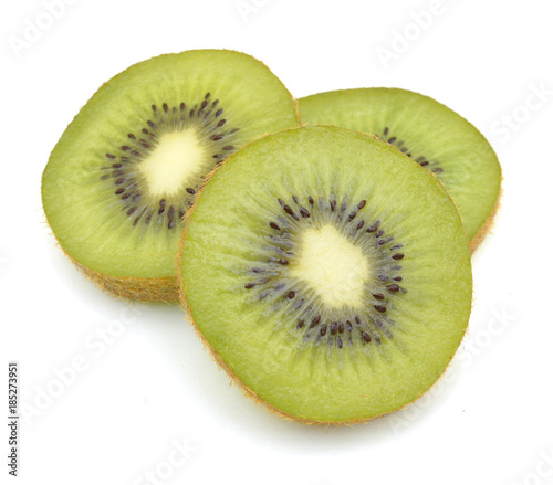 Slices of kiwi on a white