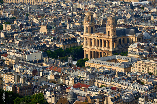 Aerial view on Saint-Sulpice Church and Paris rooftops at sunset (mansard and dormer roofs). 6th Arrondissment, Paris, France