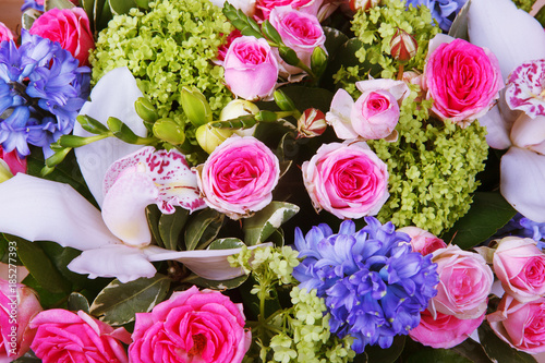 A bouquet of flowers  roses  hyacinths  orchids. Background of flowers