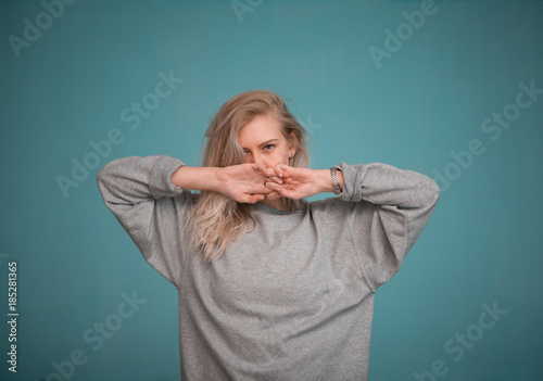 Posing in front of a colour wall