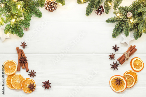 Christmas decorations for Mulled wine. Tree branches, cones, cinnamon sticks, star anise, dried oranges. Top view, flat lays. Top view, flat lay