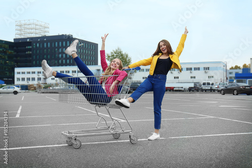 Two happy hipster girls hav...