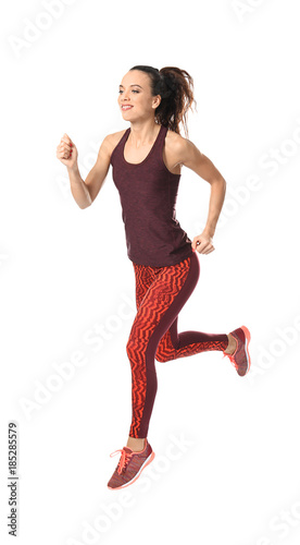 Young woman in sportswear r...