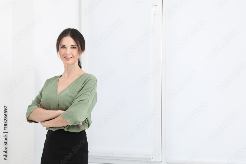 Young female notary in office wear indoors Young female notary in office wear indoors