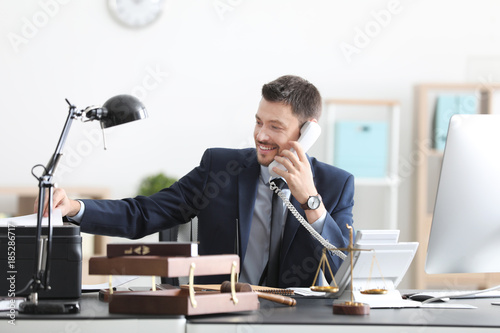 Young male notary working i...