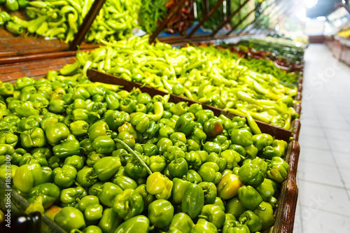 Shop bazaar fresh vegetables. Varieties of green pepper © Parilov