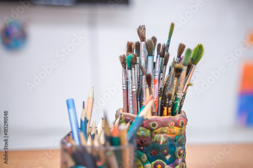 Set of artistic brushes in basket