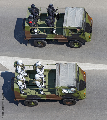 Military vehicle with soldiers photo