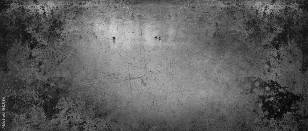 Grungy rough textured concrete wall black background Grungy rough textured concrete wall black background