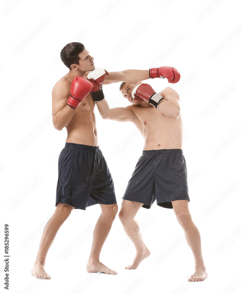 Attractive young boxers fighting on white background Attractive young boxers fighting on white background