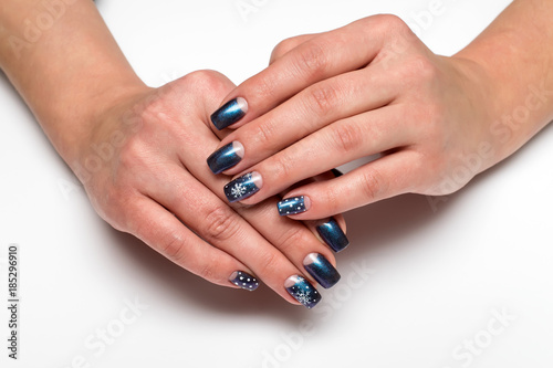 Winter blue manicure with snowflakes on long square nails  